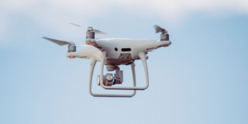 White drone in mid air
